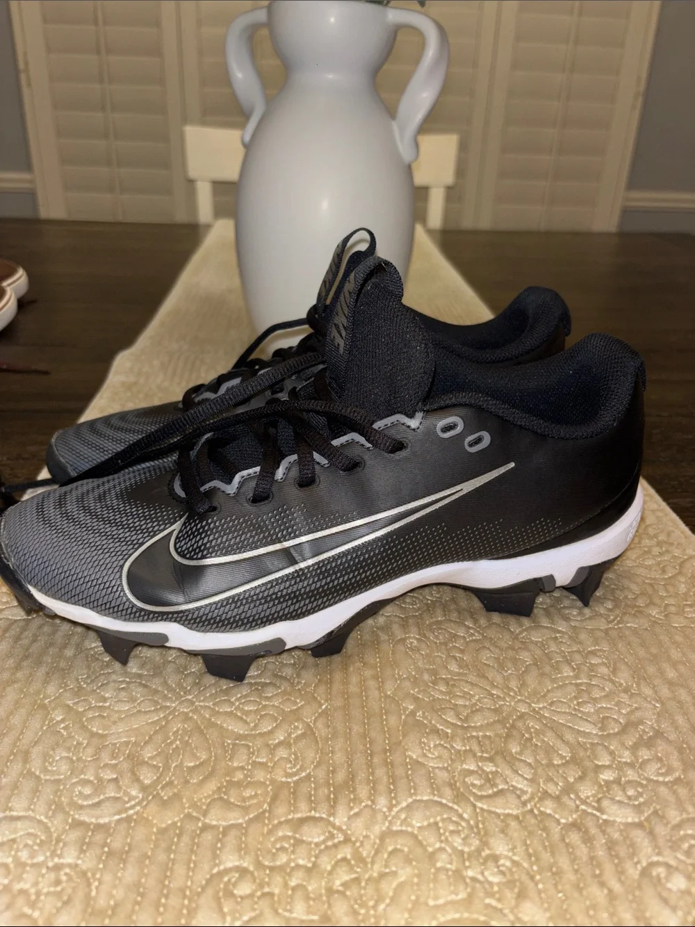 Youth Nike Black and Gray Football Cleats with Silver Swoosh